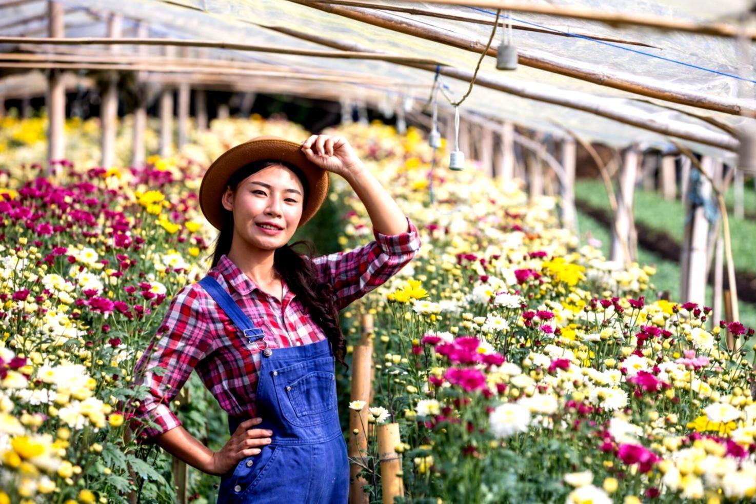 Students working on floral arrangements during workshop session